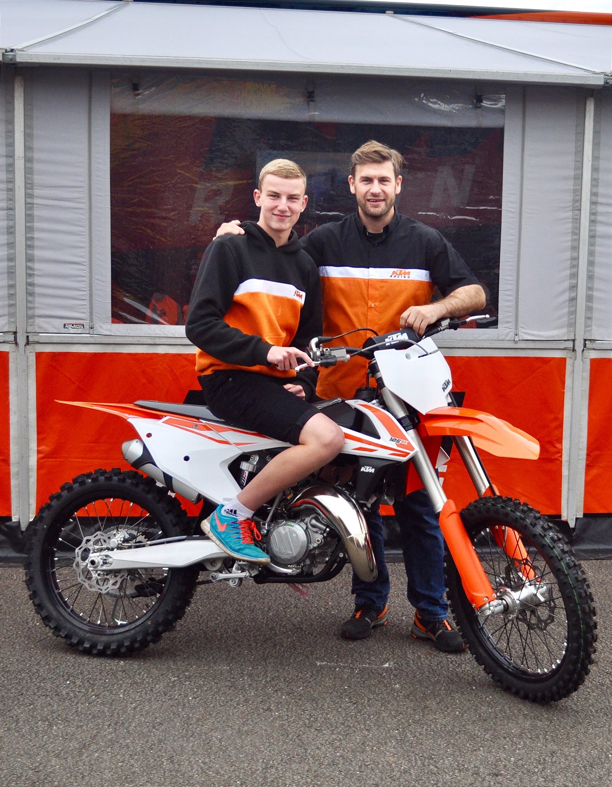Aaron Wright collects 125SX from Matt Walker