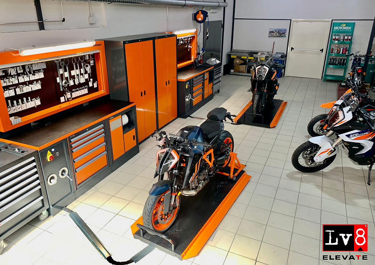 ktm-official-motorcycle-workshop-dealership-scissor-lifts-paddock-stand-suspension-workbench