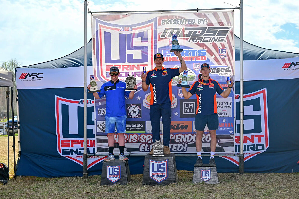 JOHNNY GIRROIR AND GUS RIORDAN PODIUM